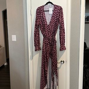 Wrap around floral dress, high slit on thigh, long sleeves.